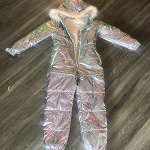 Pink metallic womens ski suit.